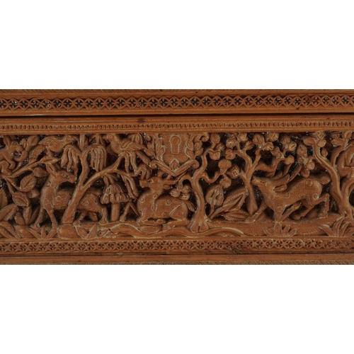  Good Anglo Indian sandalwood wood table casket with lift off lid and paw feet profusely carved with ... 