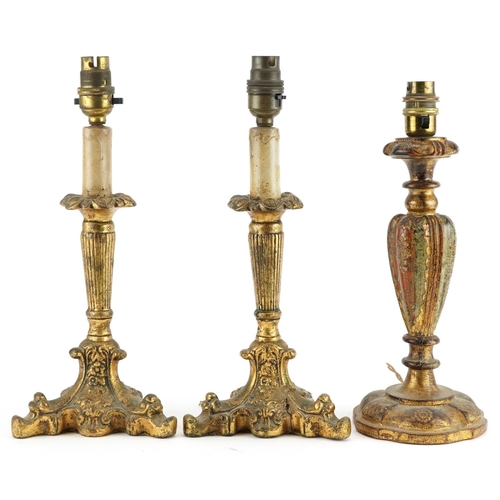 209 - Pair of 19th century French style giltwood candlesticks and an Italian example, the pair each 33cm h... 