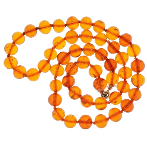 2658 - Natural amber coloured bead necklace, each bead approximately 12.5mm in diameter, overall 70cm in le... 