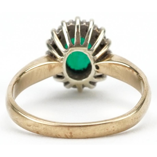 2245 - 9ct gold emerald and diamond cluster ring with diamond set shoulders, the emerald approximately 6.0m... 