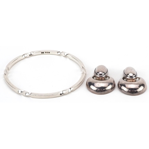 2645 - Heavy Modernist silver bangle and pair of Victorian style sterling silver clip on earrings, the bang... 