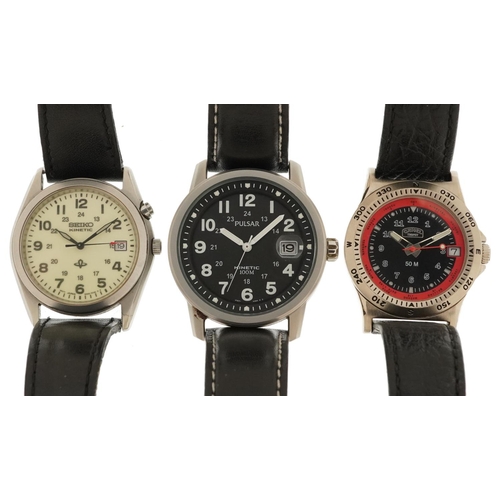 2750 - Three gentlemen's wristwatches comprising Pulsar kinetic, Seiko kinetic and Camel Trophy, the larges... 