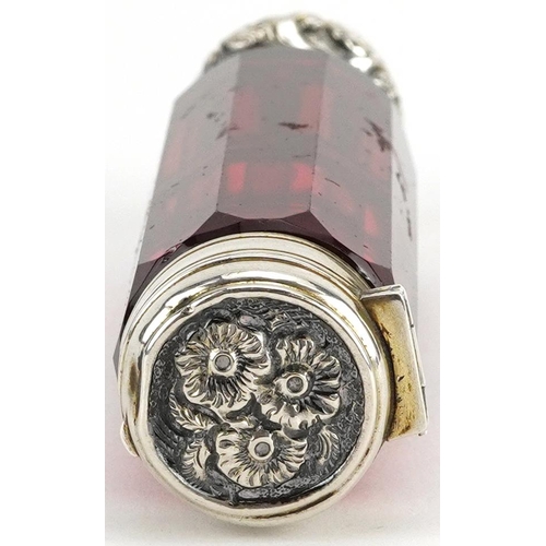 64 - Victorian ruby glass double ended scent bottle with unmarked silver mounts, 10cm in length