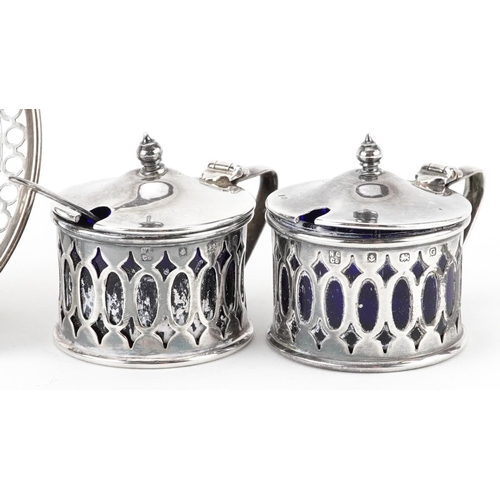 198 - Northern Goldsmiths Co, George V silver four piece cruet set and matching circular dish, Birmingham ... 