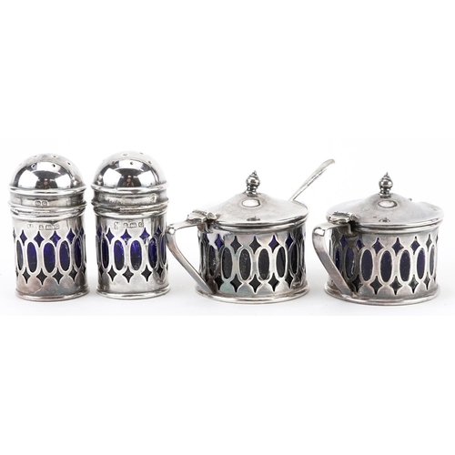 198 - Northern Goldsmiths Co, George V silver four piece cruet set and matching circular dish, Birmingham ... 