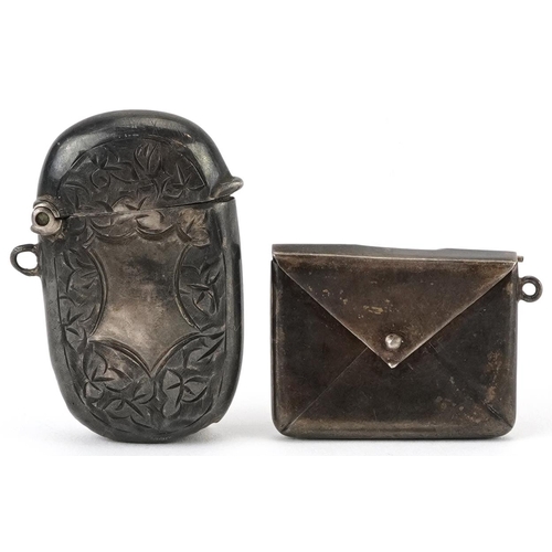 394 - Edwardian silver floral engraved vesta and a stamp case in the form of an envelope, the largest 4cm ... 