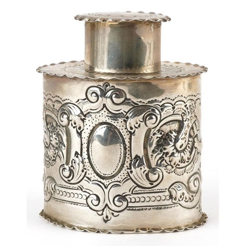 134 - Josiah Williams & Co, Edwardian silver tea caddy embossed with flowers and scrolls, London 1905, 9.5... 