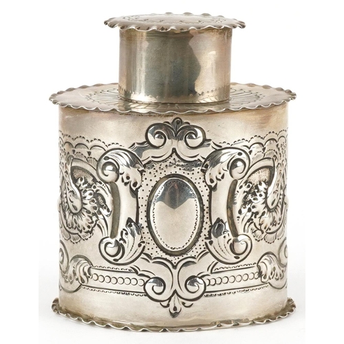 134 - Josiah Williams & Co, Edwardian silver tea caddy embossed with flowers and scrolls, London 1905, 9.5... 