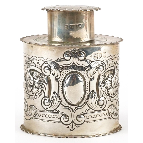 134 - Josiah Williams & Co, Edwardian silver tea caddy embossed with flowers and scrolls, London 1905, 9.5... 