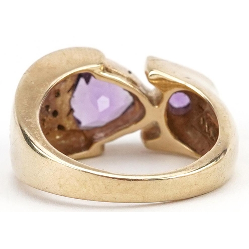 2009 - Modernist 9ct gold amethyst and diamond ring, size T, 13.6g