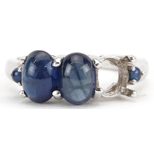 2519 - 9ct white gold cabochon sapphire ring, the largest sapphire approximately 7.10mm x 5.50mm, size N, 3... 