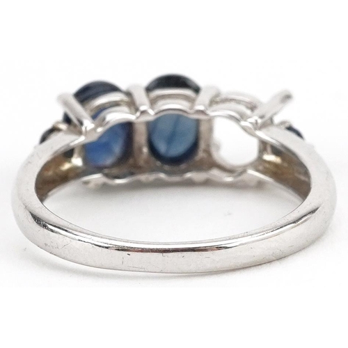 2519 - 9ct white gold cabochon sapphire ring, the largest sapphire approximately 7.10mm x 5.50mm, size N, 3... 