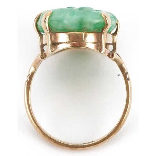 2142 - 9ct gold Chinese carved green jadeite ring, size O, 8.0g