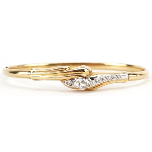 2201 - 14ct gold cubic zirconia hinged bangle, 6.5cm wide, 8.9g