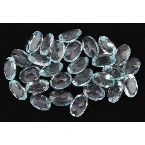 2097 - Twenty eight loose oval aquamarine stones, approximately 10.8 carat in total