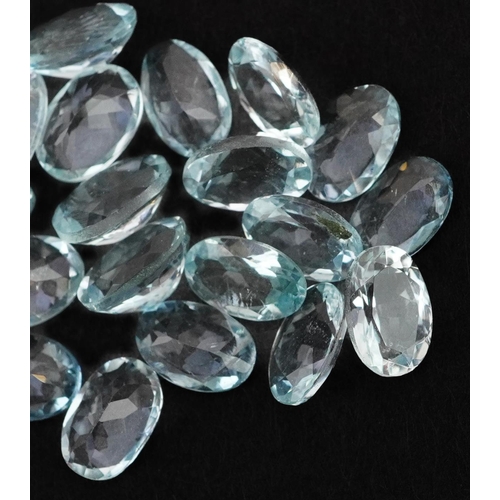 2097 - Twenty eight loose oval aquamarine stones, approximately 10.8 carat in total