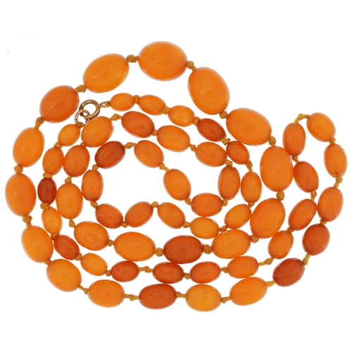 2024 - Butterscotch amber coloured graduated bead necklace, the largest bead approximately 19mm x 15mm, ove... 