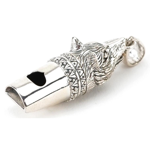 2712 - Novelty silver whistle pendant in the form of a wolf's head, 4.6cm high, 10.2g