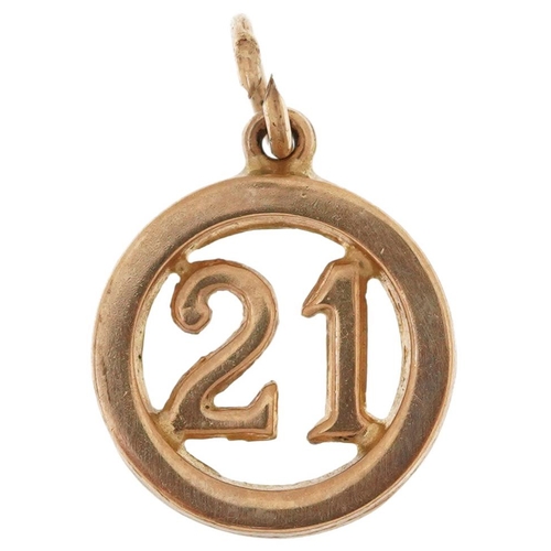 2460 - 9ct gold 21st birthday charm, 1.3cm in diameter, 0.8g