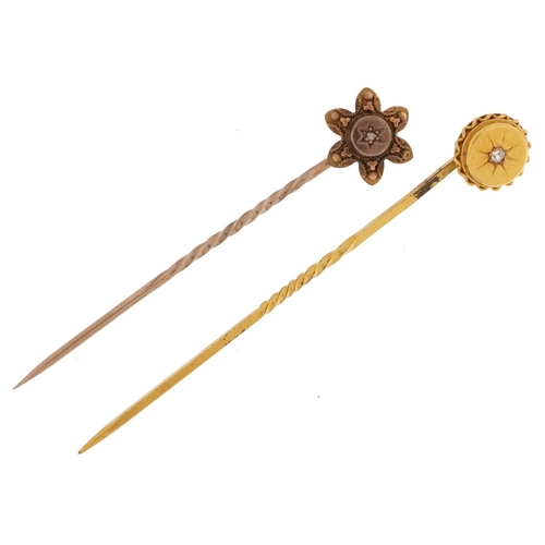 2516 - Two unmarked gold and yellow metal diamond solitaire stickpins, one marked 15ct, the other unmarked,... 