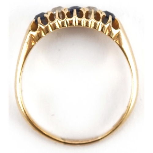 2216 - 18ct gold diamond and sapphire five stone ring with pierced setting, the largest sapphire approximat... 