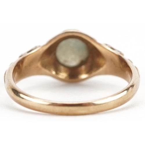 2274 - 9ct gold cabochon green stone ring with scrolled shoulders, size O, 2.9g