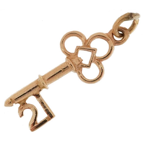 2630 - 9ct gold 21st birthday key charm, 2.1cm in length, 0.8g