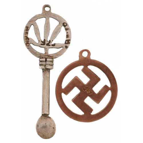 2609 - 9ct gold swastika charm and a silver snuff spoon charm, the largest 3.5cm in length, total 1.5g