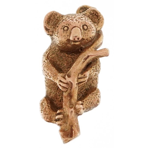 2247 - 9ct gold charm in the form of a koala on a branch, 1.6cm high, 4.2g