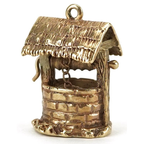 2170 - 9ct gold charm in the form of a wishing well with moving handle and bucket, 2cm high, 6.5g