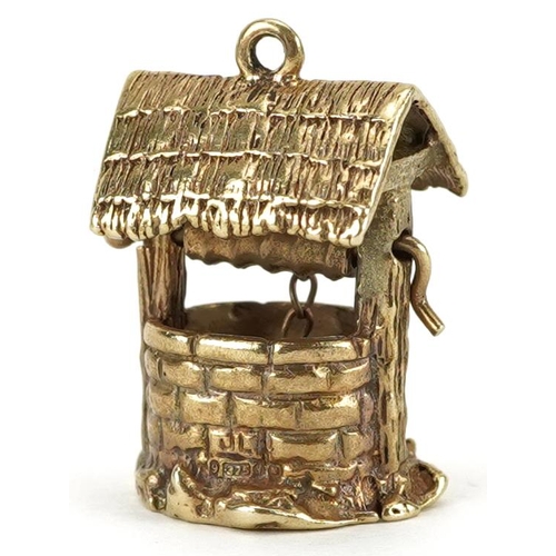 2170 - 9ct gold charm in the form of a wishing well with moving handle and bucket, 2cm high, 6.5g