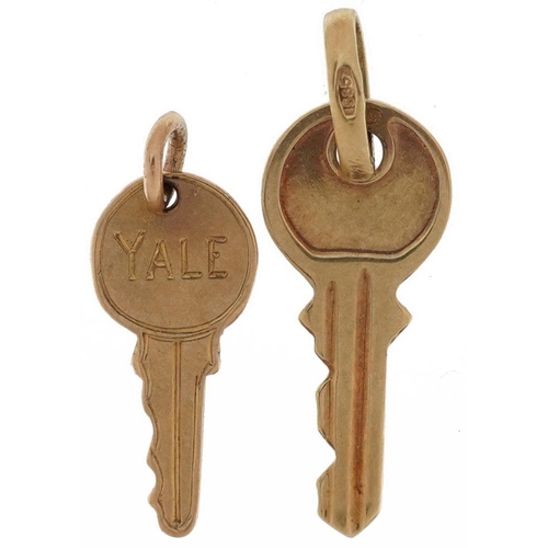 2637 - Two gold charms in the form of keys, one 14ct gold and one 9ct gold, the largest 2.2cm high, total 1... 