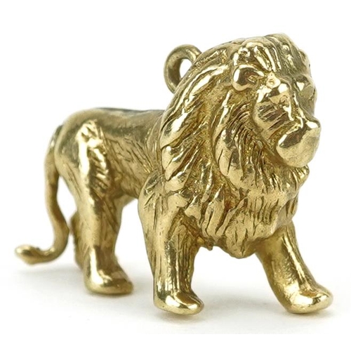 2226 - 9ct gold charm in the form of a standing lion, 2.1cm wide, 4.7g