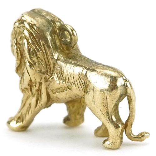 2226 - 9ct gold charm in the form of a standing lion, 2.1cm wide, 4.7g