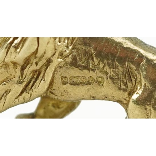 2226 - 9ct gold charm in the form of a standing lion, 2.1cm wide, 4.7g