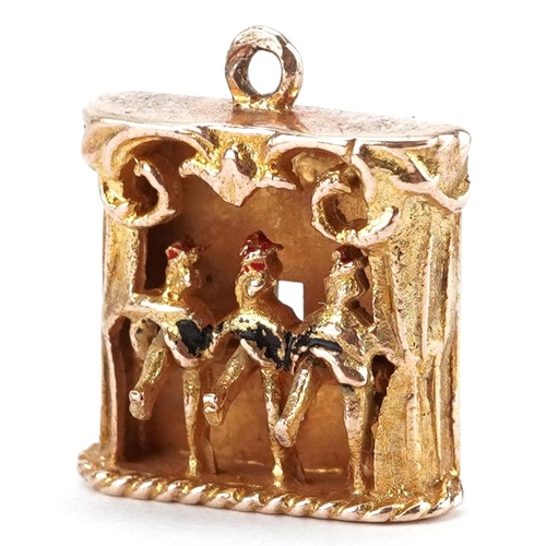 2241 - 9ct gold charm in the form of three can-can dancers with moving legs, 1.5cm high, 3.1g