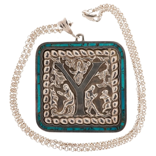 2502 - Large Mexican silver and matrix turquoise initial Y pendant cast with figures fighting animals, on a... 