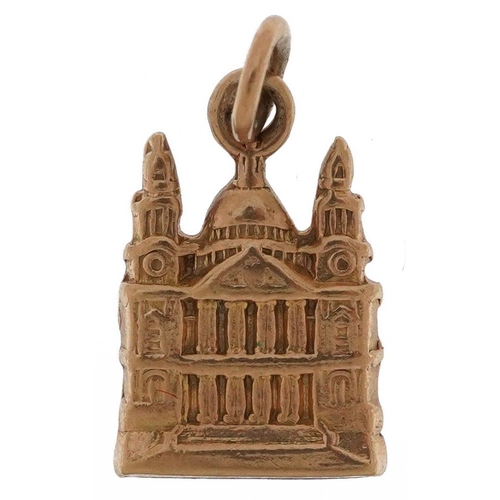 2489 - 9ct gold charm in the form of a cathedral, 1.5cm high, 1.7g