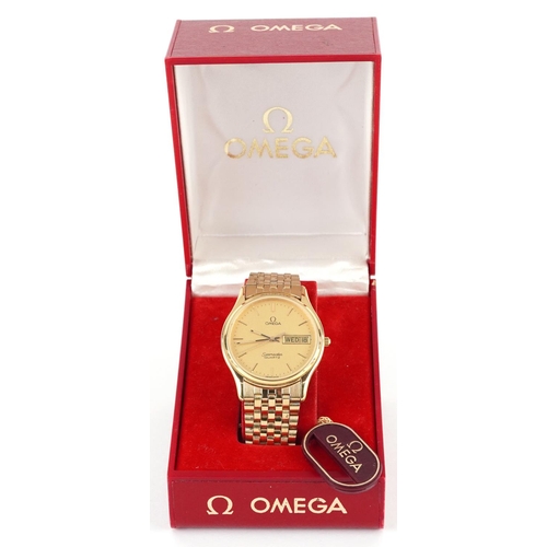 2512 - Omega, gentlemen's Omega Seamaster gold plated quartz wristwatch with day/date aperture, box and pap... 