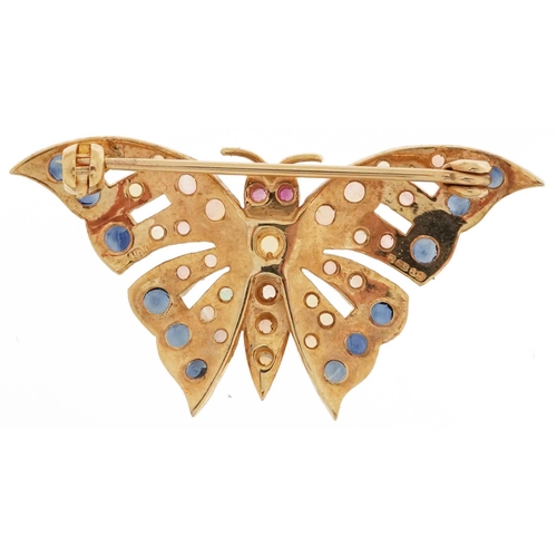 2453 - 9ct gold multi gem brooch in the form of a butterfly set with sapphires, rubies and opals, 4cm wide,... 