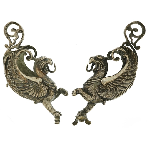 360 - Pair of 19th century silver plated classical mounts in the form of griffins, each 12.5cm high