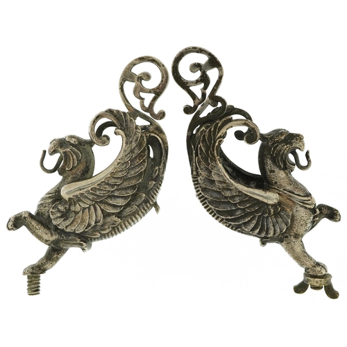 360 - Pair of 19th century silver plated classical mounts in the form of griffins, each 12.5cm high