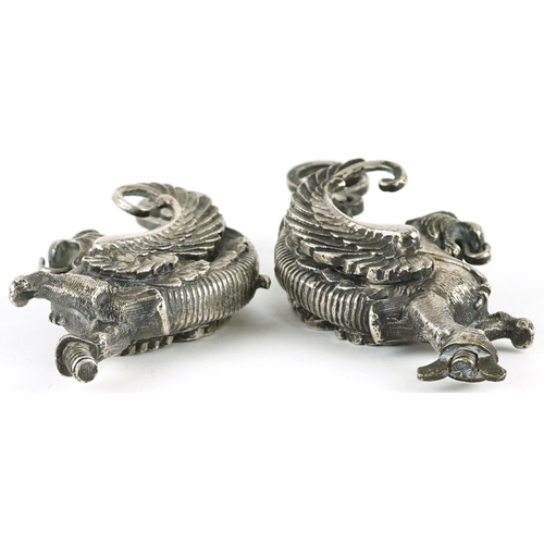 360 - Pair of 19th century silver plated classical mounts in the form of griffins, each 12.5cm high