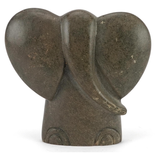 1332 - Modernist stone carving of an elephant incised Charles Tendai to the base, 11.5cm high