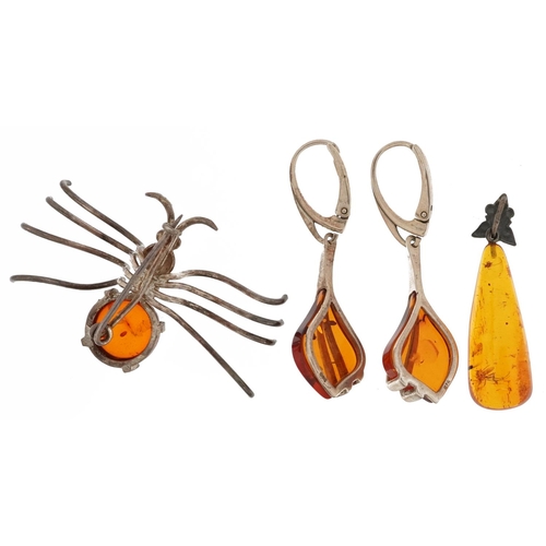 2711 - Silver and natural amber jewellery comprising a brooch in the form of a spider, pendant with encased... 