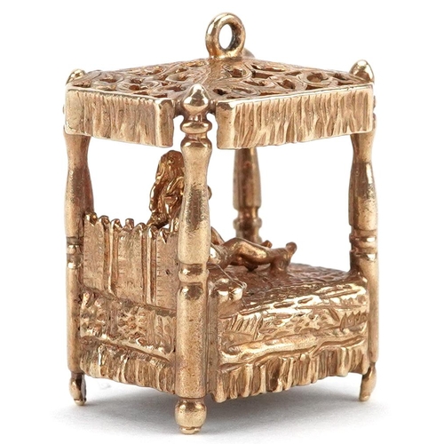 2005 - Large 9ct gold charm in the form of a nude female on a four poster bed, 2.4cm high, 12.2g