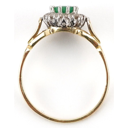 2161 - Unmarked gold emerald and diamond cluster ring, tests as 18ct gold, the emerald approximately 7.50mm... 