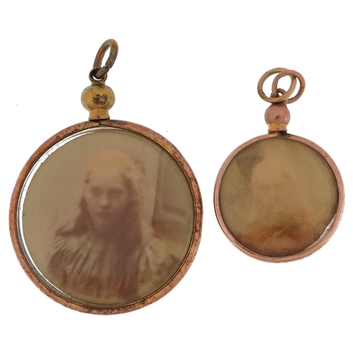 2542 - Two circular open lockets comprising one 9ct gold and one rolled gold, the largest 3.1cm in diameter... 