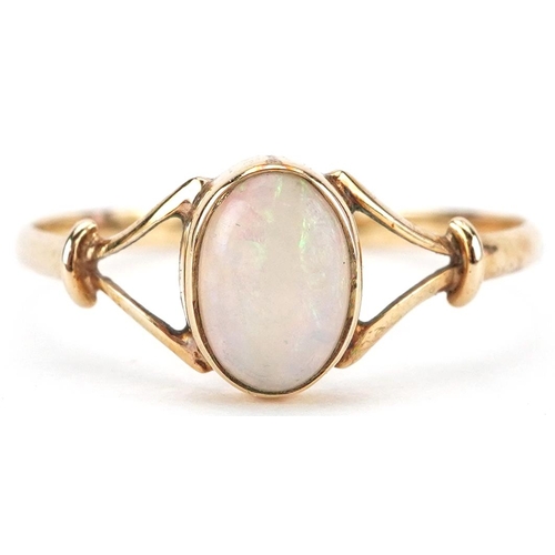 2293 - 9ct gold cabochon opal ring with split shoulders, size N/O, 0.9g