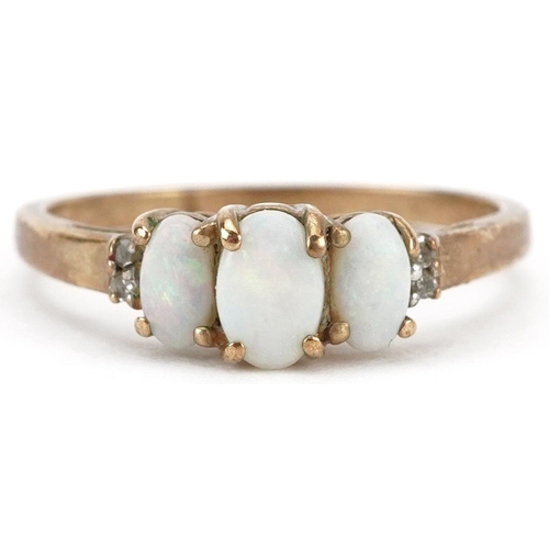 2261 - 9ct gold cabochon opal three stone ring with diamond set shoulders, size P, 1.8g